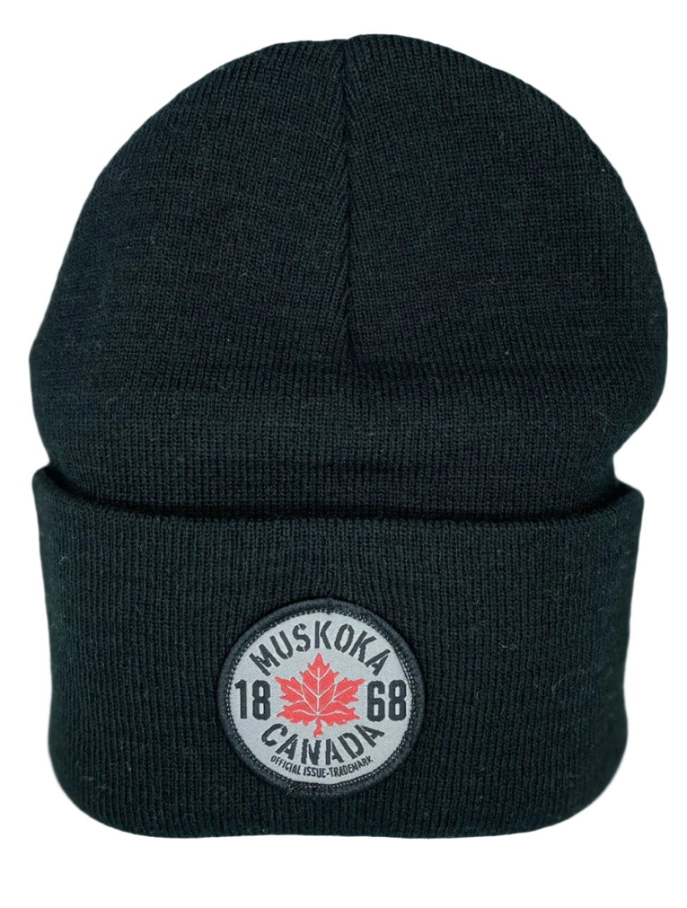 A black beanie with a logo on the cuff, featuring text and a maple leaf symbol.
